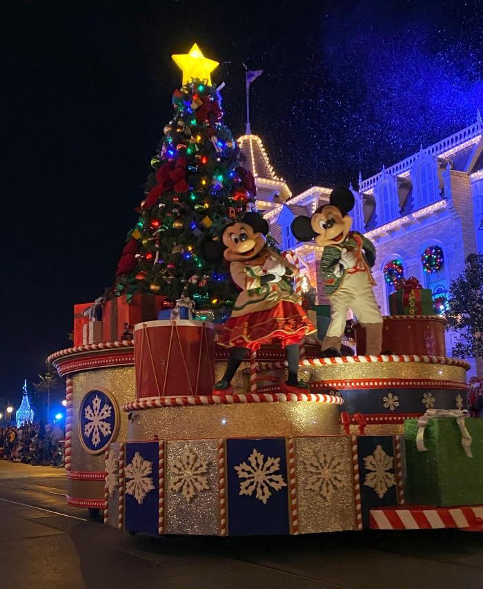 Mickey and Minnie in the Christmas parade at Magic Kingdom.
