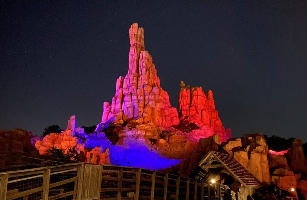 Big Thunder Mountain Railroad in Frontierland at night.