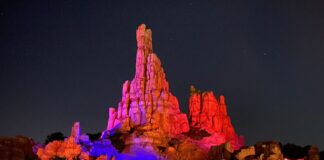 Big Thunder Mountain Railroad in Frontierland at night.