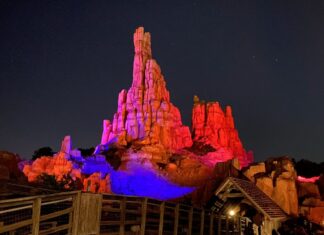 Big Thunder Mountain Railroad in Frontierland at night.