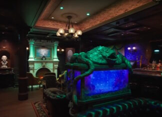 The Haunted Mansion Parlor lounge on the Disney Treasure.