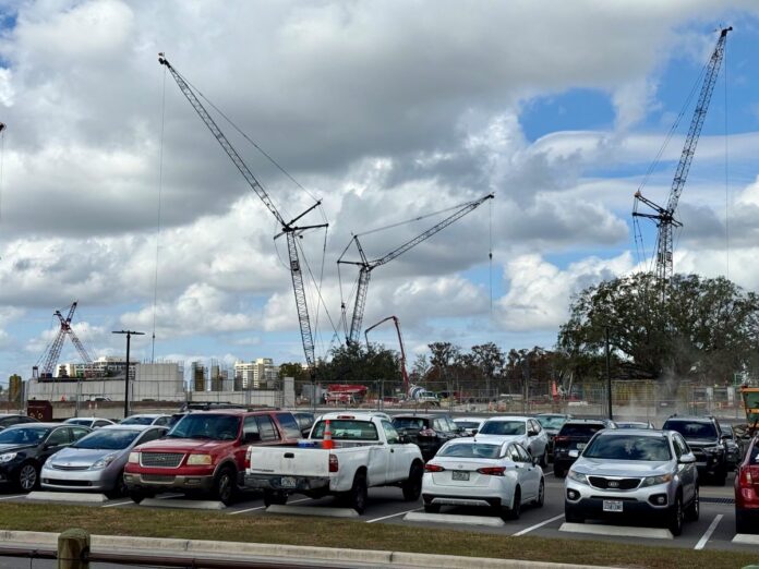 Cranes working on Disney Lakeshore Lodge project.