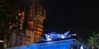 Nighttime picture of the Quinjet at Avengers Campus.