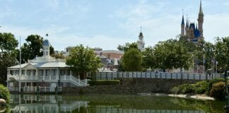 Construction walls up in Liberty Square around the Rivers of America.
