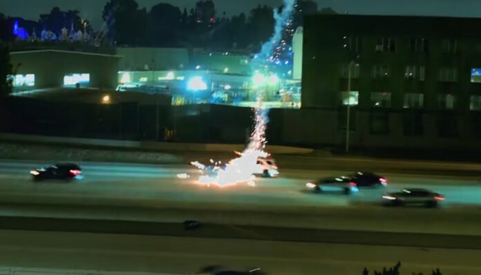 A stray firework shell hits the road just outside Disneyland.