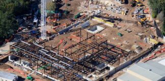 Encanto Ride Building Emerging at Disney’s Animal Kingdom Aerial view of steel framing for the Encanto ride building at Animal Kingdom.