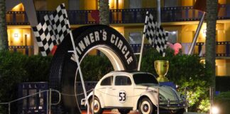 Disney’s All-Star Movies Refurbishing Rooms Beginning in May 2026 Herbie the Love Bug car parked outside All-Star Movies Resort.