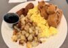 Disney World’s Best Breakfast Deal Is Officially Gone Plate with eggs, potatoes, and Mickey waffles.