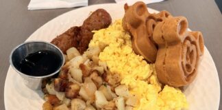 Disney World’s Best Breakfast Deal Is Officially Gone Plate with eggs, potatoes, and Mickey waffles.