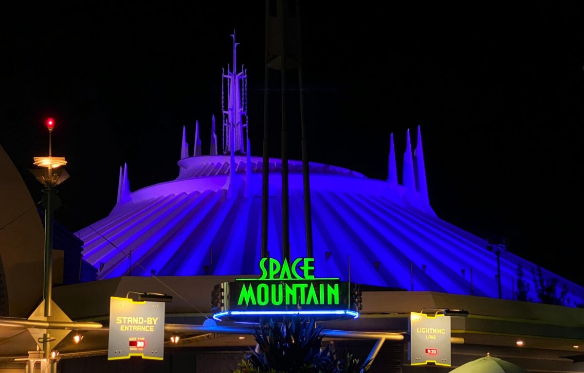 Entrance of Space Mountain at night.